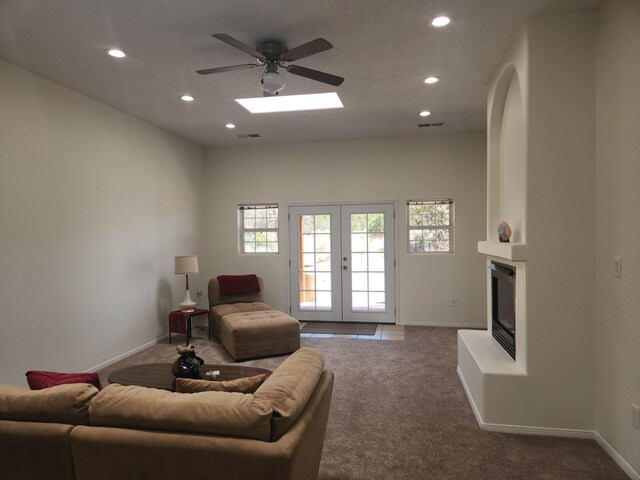 unfurnished bedroom featuring a textured ceiling, dark carpet, and a closet