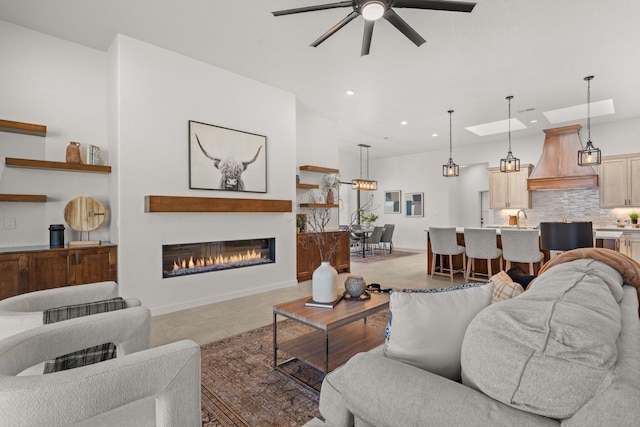 tiled living room with ceiling fan