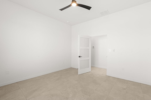 unfurnished room featuring ceiling fan