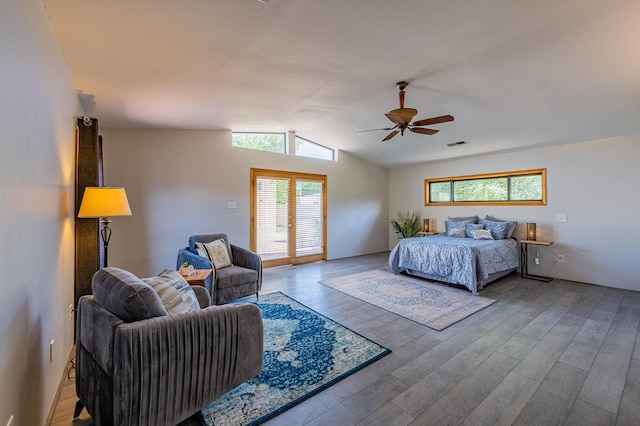 bedroom with french doors, hardwood / wood-style floors, vaulted ceiling, and ceiling fan