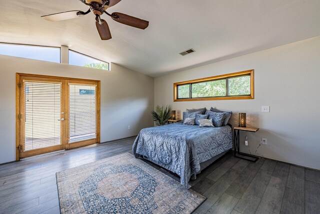 bedroom featuring ceiling fan, lofted ceiling, and hardwood / wood-style floors