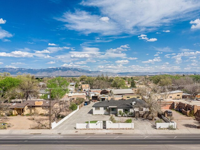 drone / aerial view featuring a mountain view