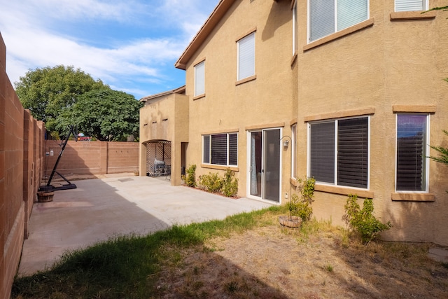 back of house featuring a patio area