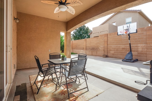 view of patio featuring ceiling fan