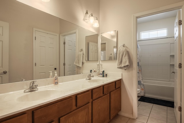 bathroom with vanity, shower / bathtub combination with curtain, and tile patterned floors