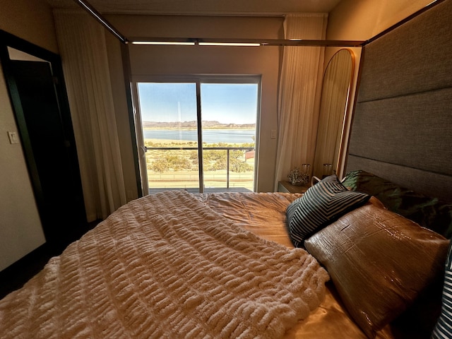 300 Catfish Rd, Elephant Butte, NM 87935 - bedroom with access to exterior and a water view
