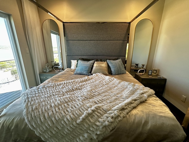 300 Catfish Rd, Elephant Butte, NM 87935 - bedroom featuring multiple windows and arched walkways