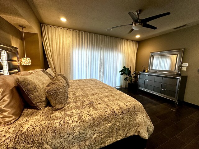 300 Catfish Rd, Elephant Butte, NM 87935 - bedroom featuring a textured ceiling, visible vents, ceiling fan, baseboards, and recessed lighting