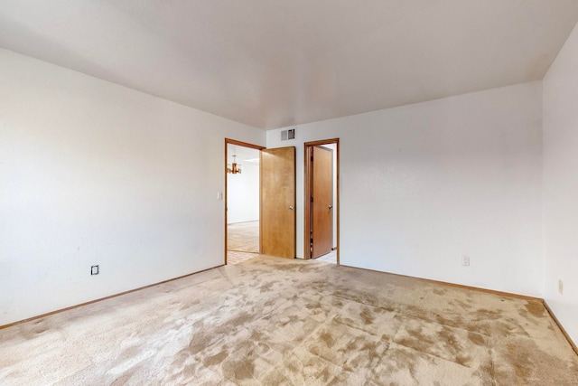 view of carpeted spare room