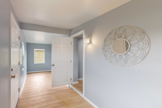 hallway featuring light hardwood / wood-style flooring