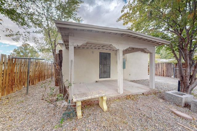 rear view of property with a patio