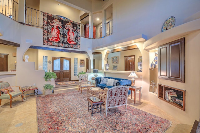 living room with a high ceiling