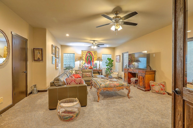 living room with carpet and ceiling fan