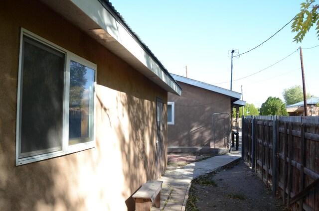 view of property exterior featuring an outdoor structure