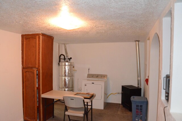 bedroom with a closet, ceiling fan, a textured ceiling, and carpet