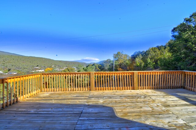 7 Shasta Ct, Cedar Crest, NM 87008 - wooden deck with a mountain view
