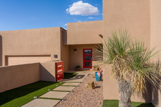 property entrance with a garage