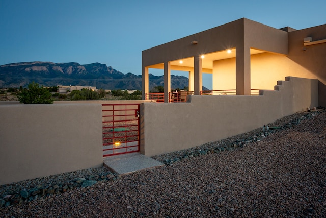 view of side of property with a mountain view