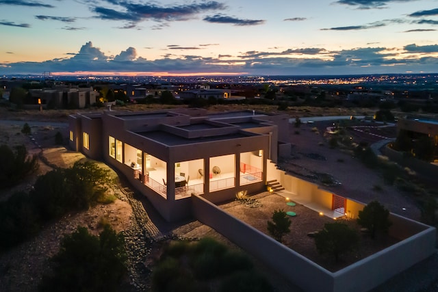 view of aerial view at dusk