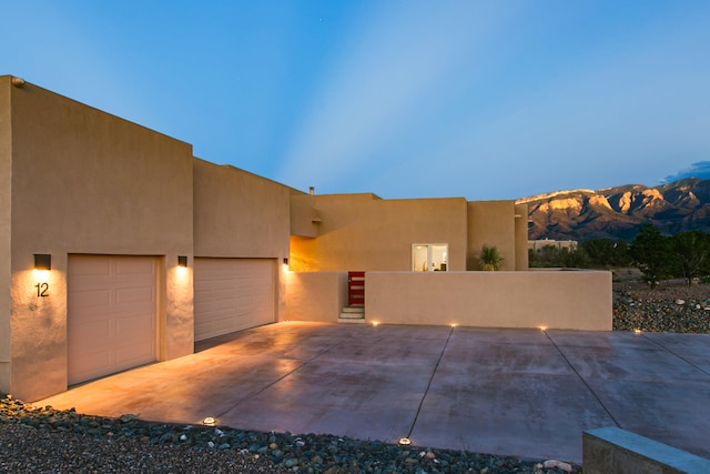 adobe home with a mountain view