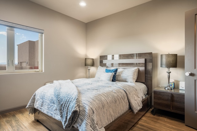 bedroom featuring wood-type flooring