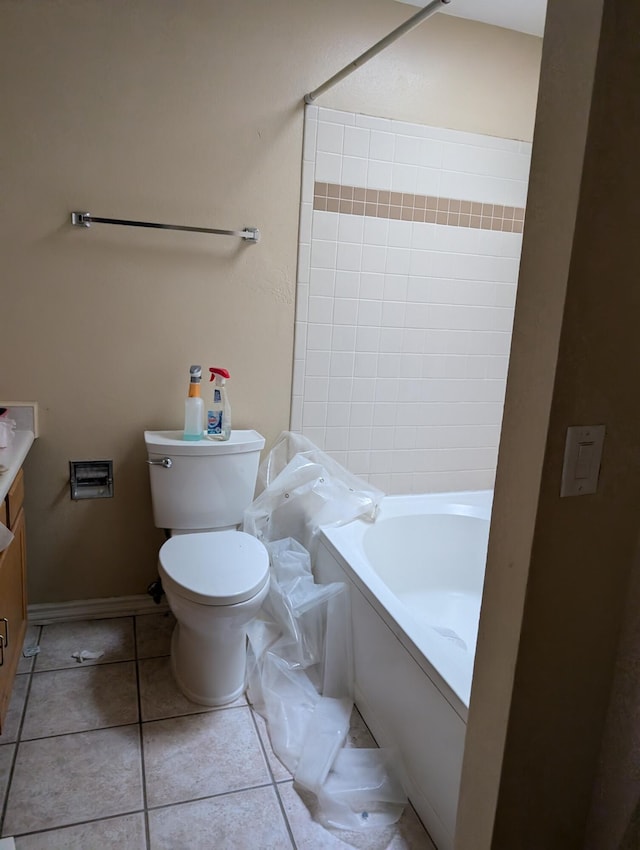 bathroom featuring vanity, toilet, and tile patterned floors