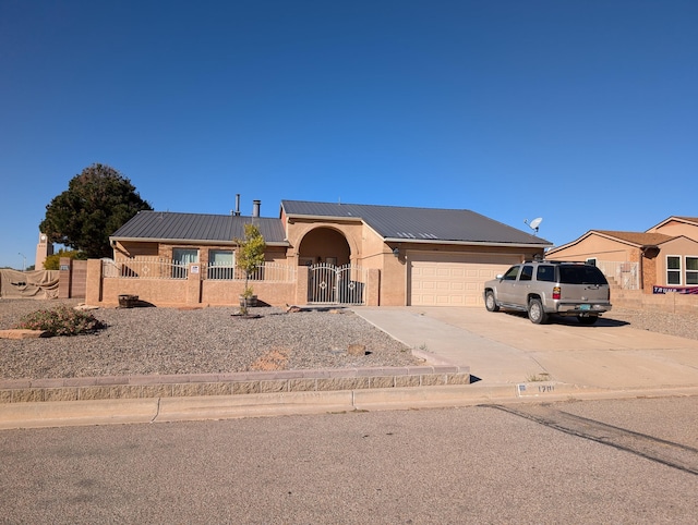 view of front of home featuring a garage