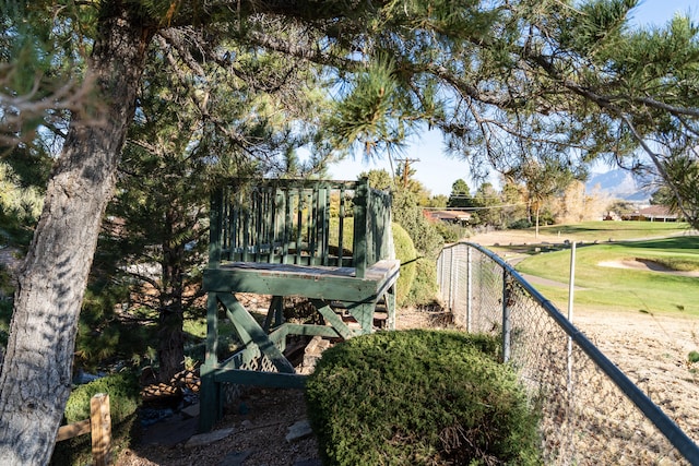 view of yard featuring a mountain view and a playground