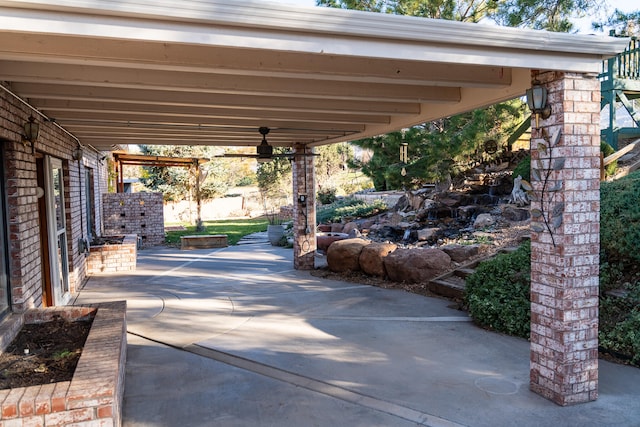 view of patio / terrace featuring ceiling fan