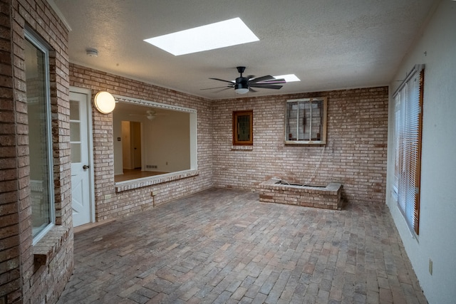 view of patio with ceiling fan