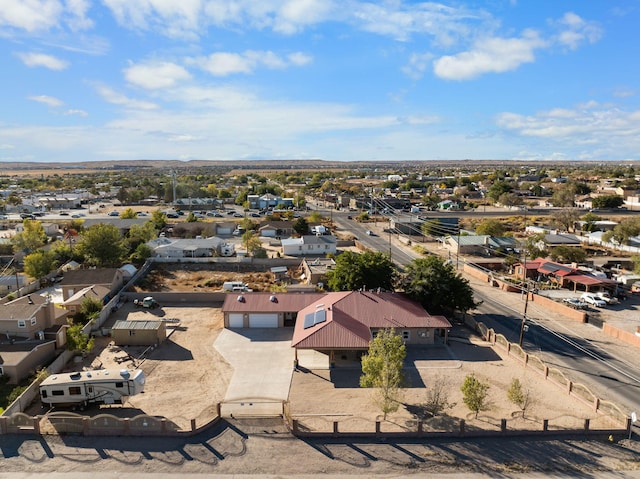 birds eye view of property with a residential view