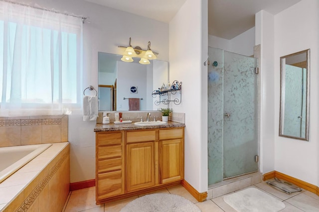 bathroom featuring vanity, tile patterned floors, and independent shower and bath