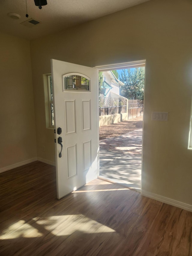 entrance foyer with dark wood-type flooring