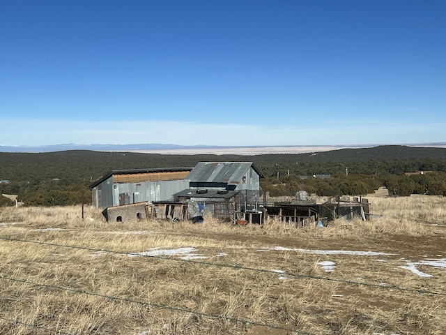 exterior space with a mountain view and a rural view