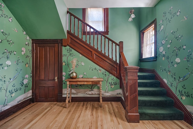 staircase featuring hardwood / wood-style flooring