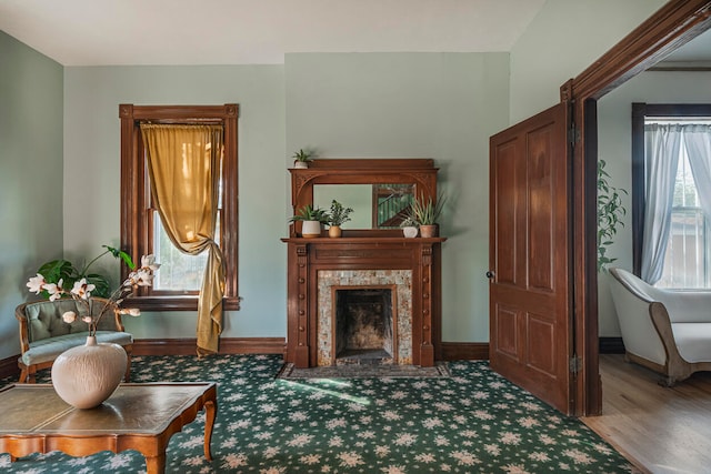 foyer with light hardwood / wood-style floors and crown molding