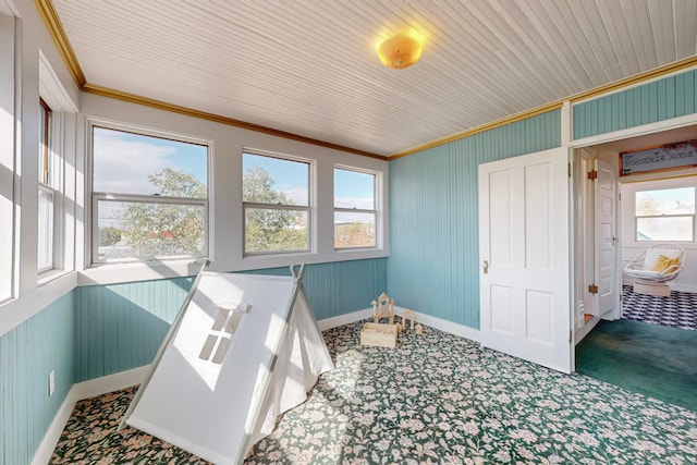 sunroom / solarium with wood ceiling and plenty of natural light