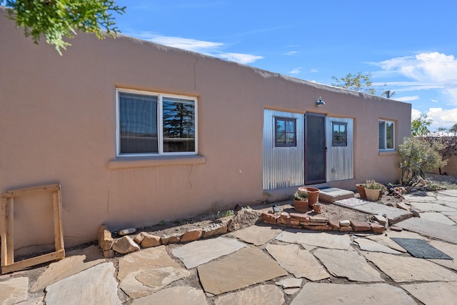 view of front of home with a patio