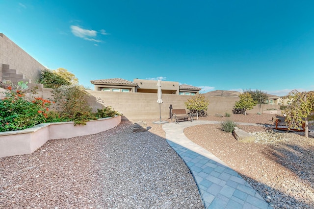 view of yard with a patio area