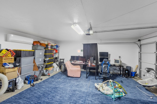 garage with a garage door opener and a wall mounted air conditioner