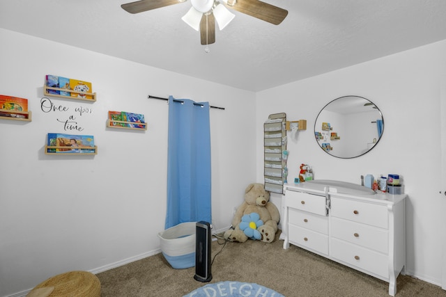 bedroom with carpet, ceiling fan, and sink