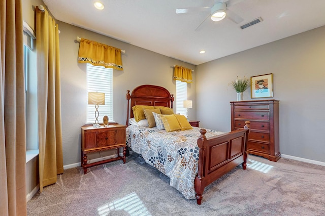 carpeted bedroom featuring ceiling fan