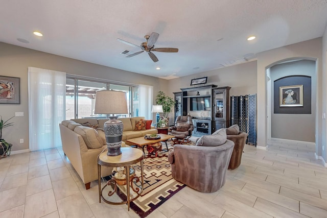 living room with ceiling fan