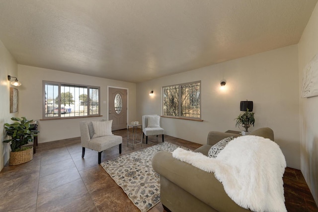 living room featuring a textured ceiling