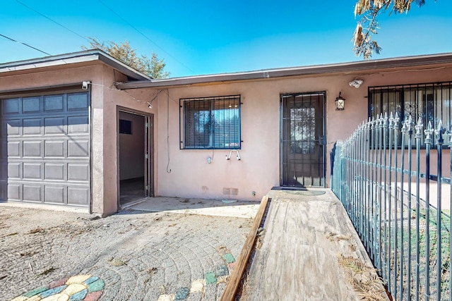 entrance to property with a garage