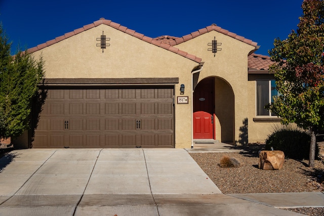 view of front of home featuring a garage