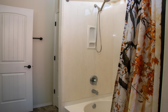 bathroom with shower / bath combo