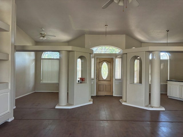 entrance foyer with decorative columns, lofted ceiling, and ceiling fan