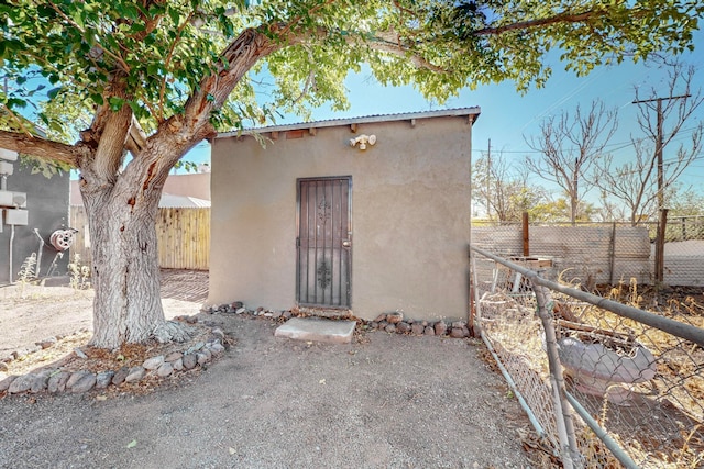 exterior space with an outbuilding