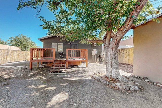 exterior space featuring a wooden deck